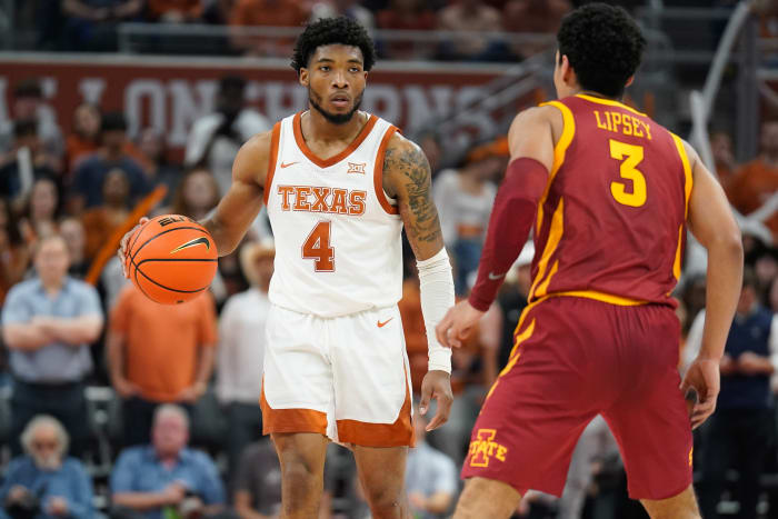 Texas Longhorns guard Tyrese Hunter (4) and Iowa State Cyclones guard Tamin Lipsey (3) during the first half at Moody Center.